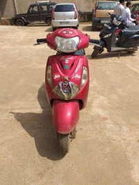 Red Suzuki Access 125