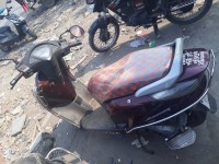 Maroon Honda Aviator