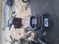 Maroon Honda Aviator