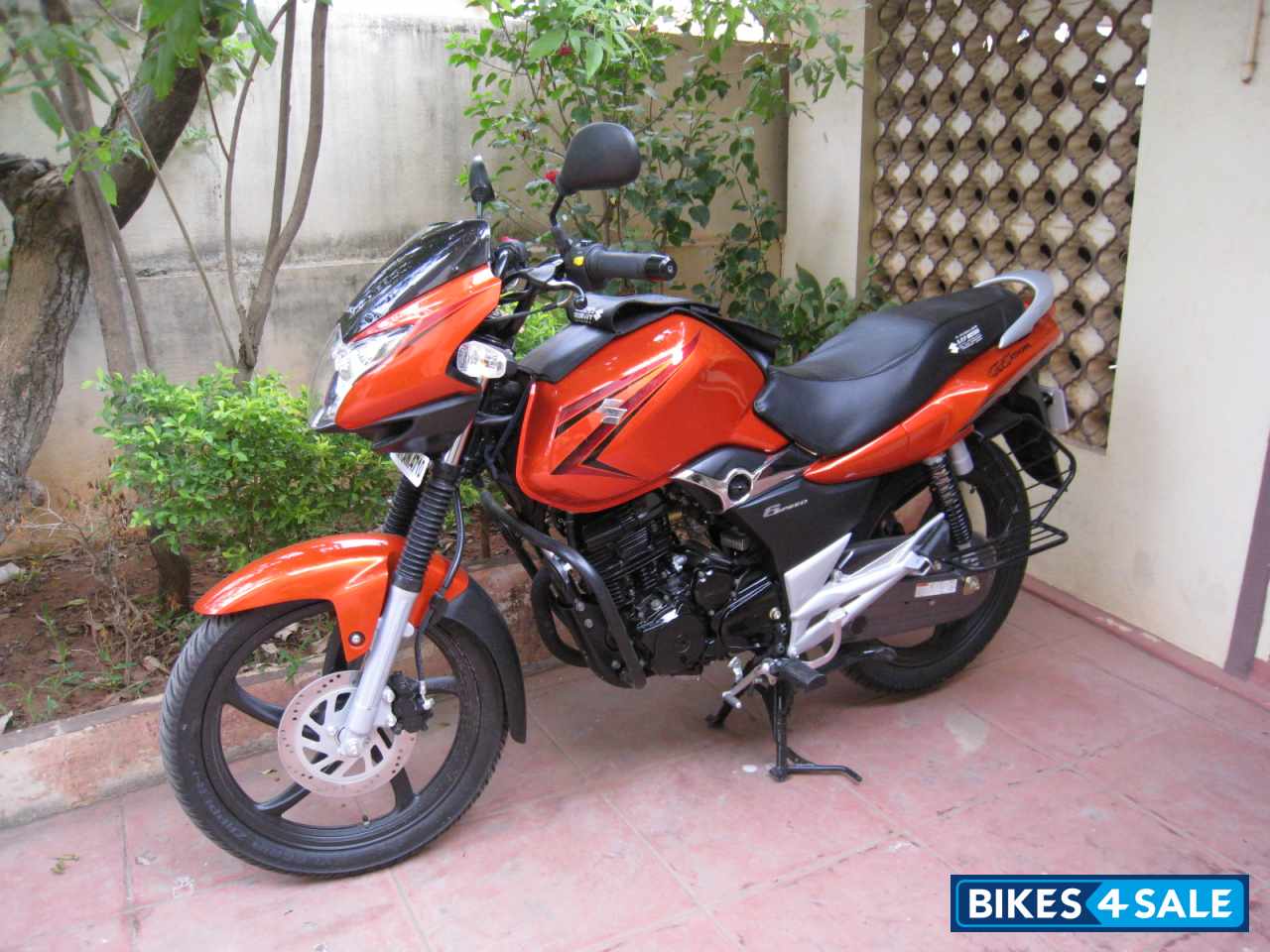 Orange Suzuki GS 150R