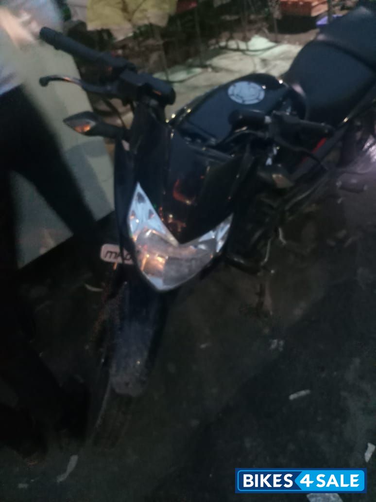 Black And Red Bajaj Pulsar 135LS