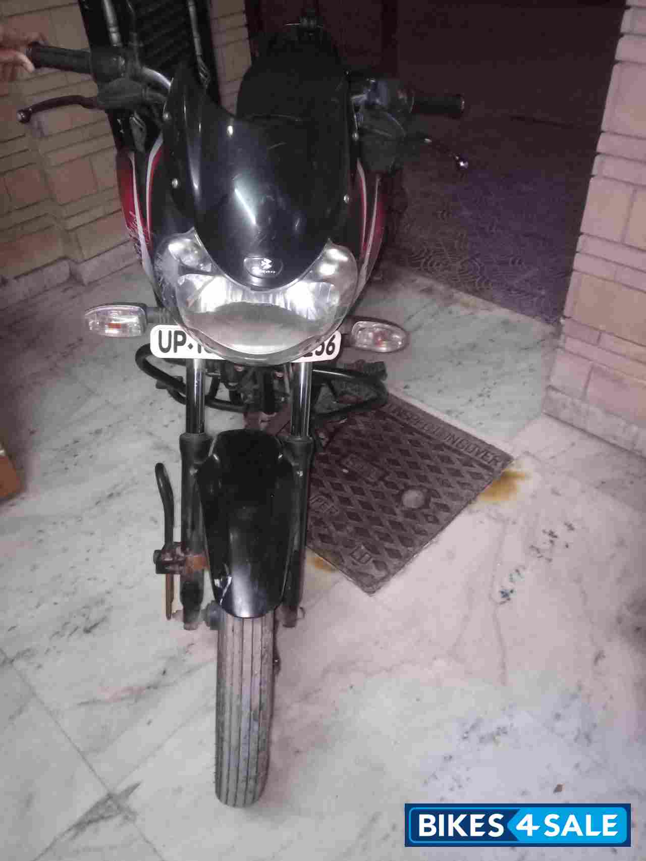 Black Red Bajaj Discover 100