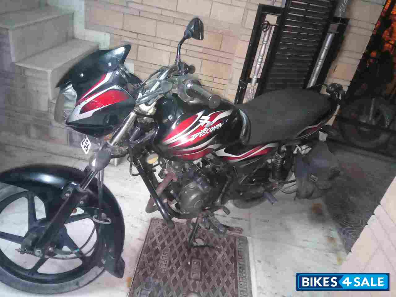 Black Red Bajaj Discover 100