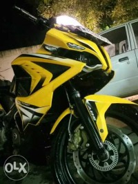 Yellow Bajaj Pulsar RS 200 ABS