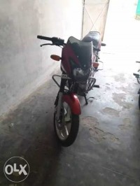 Red Bajaj Pulsar 150 DTSi