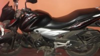 Black & Red Bajaj Discover 125 ST