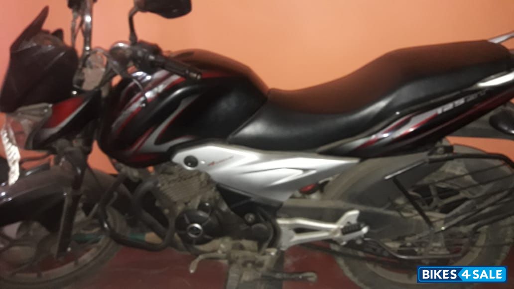Black & Red Bajaj Discover 125 ST