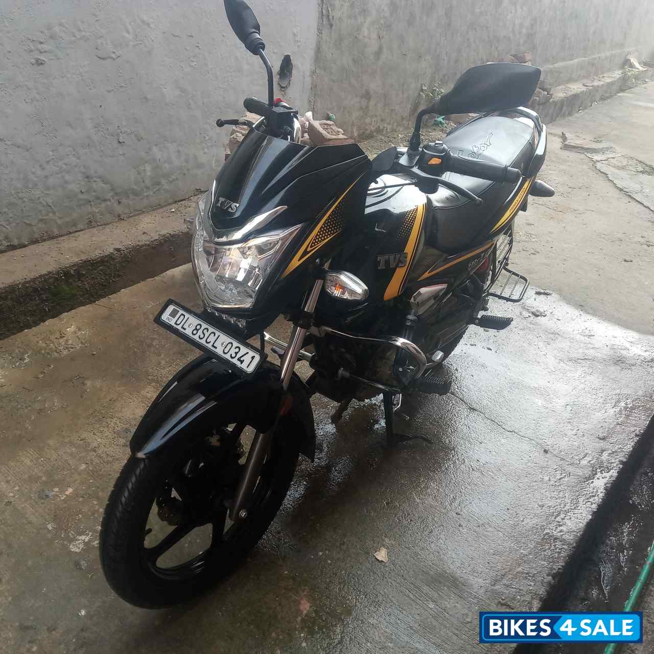 Yellow And Black TVS Victor Premium Edition