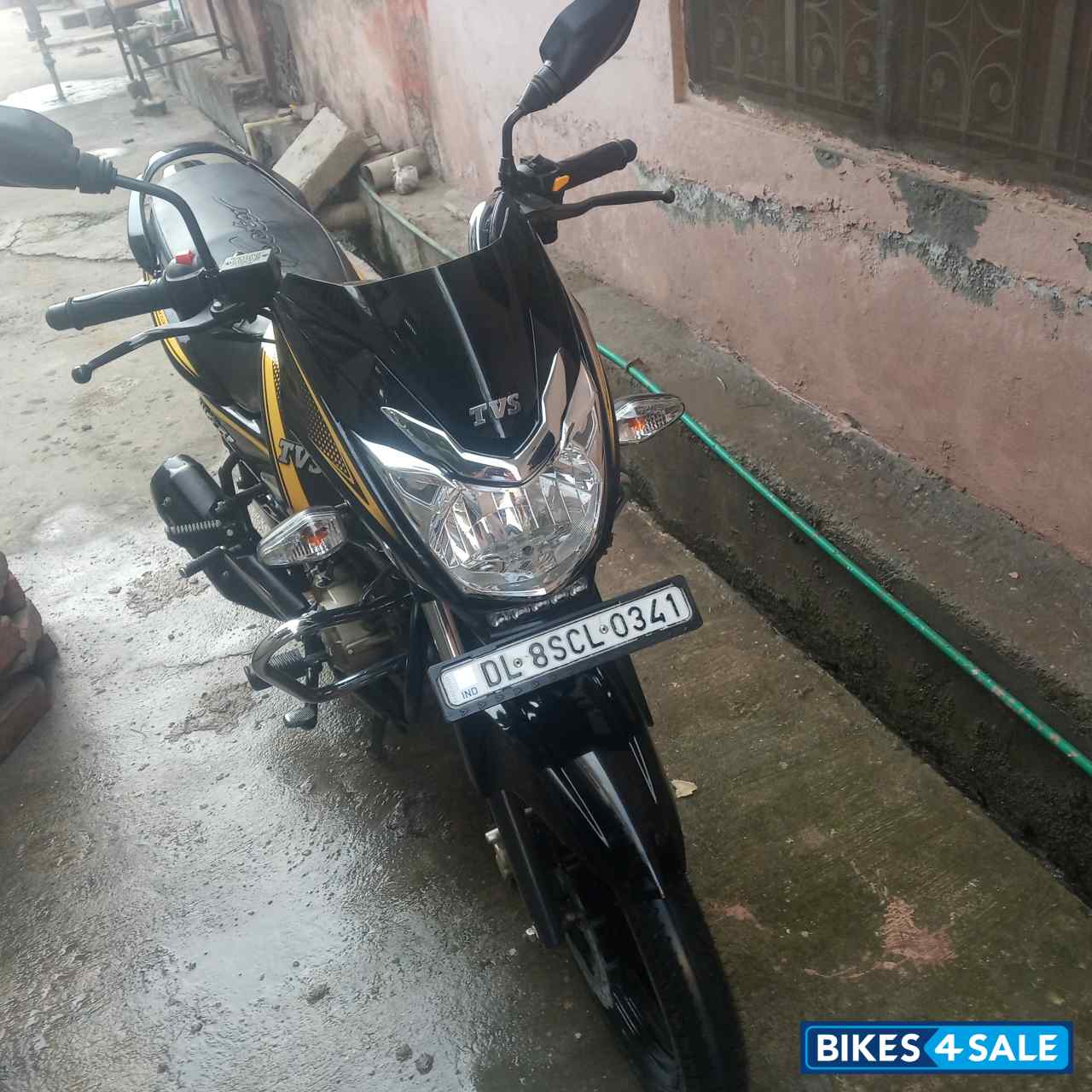 Yellow And Black TVS Victor Premium Edition