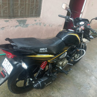 Yellow And Black TVS Victor Premium Edition