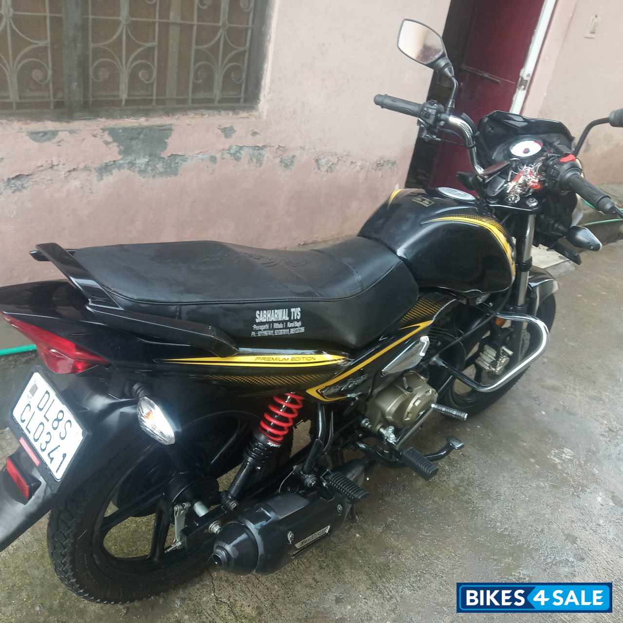 Yellow And Black TVS Victor Premium Edition