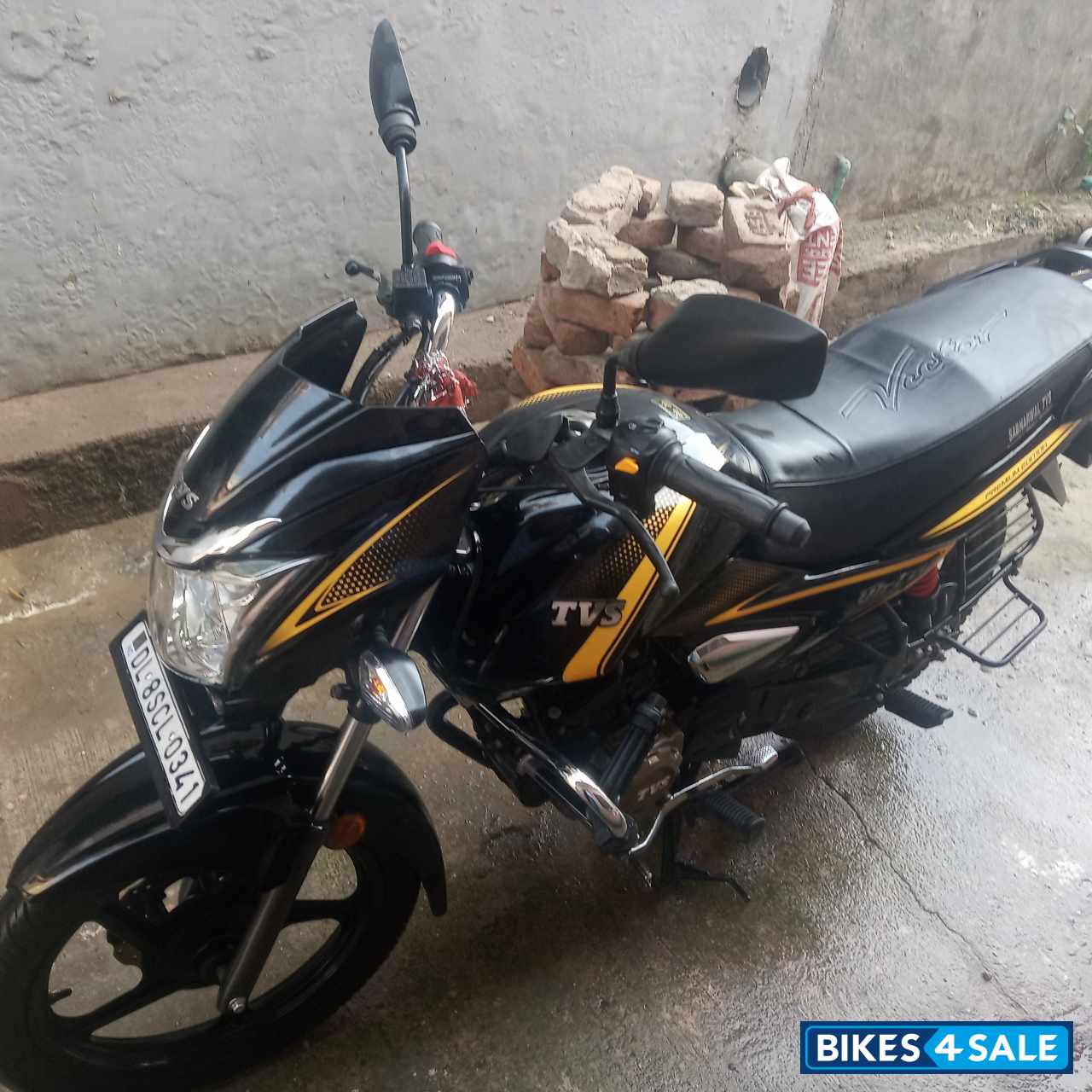 Yellow And Black TVS Victor Premium Edition
