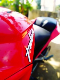 Red Bajaj Pulsar RS 200 ABS