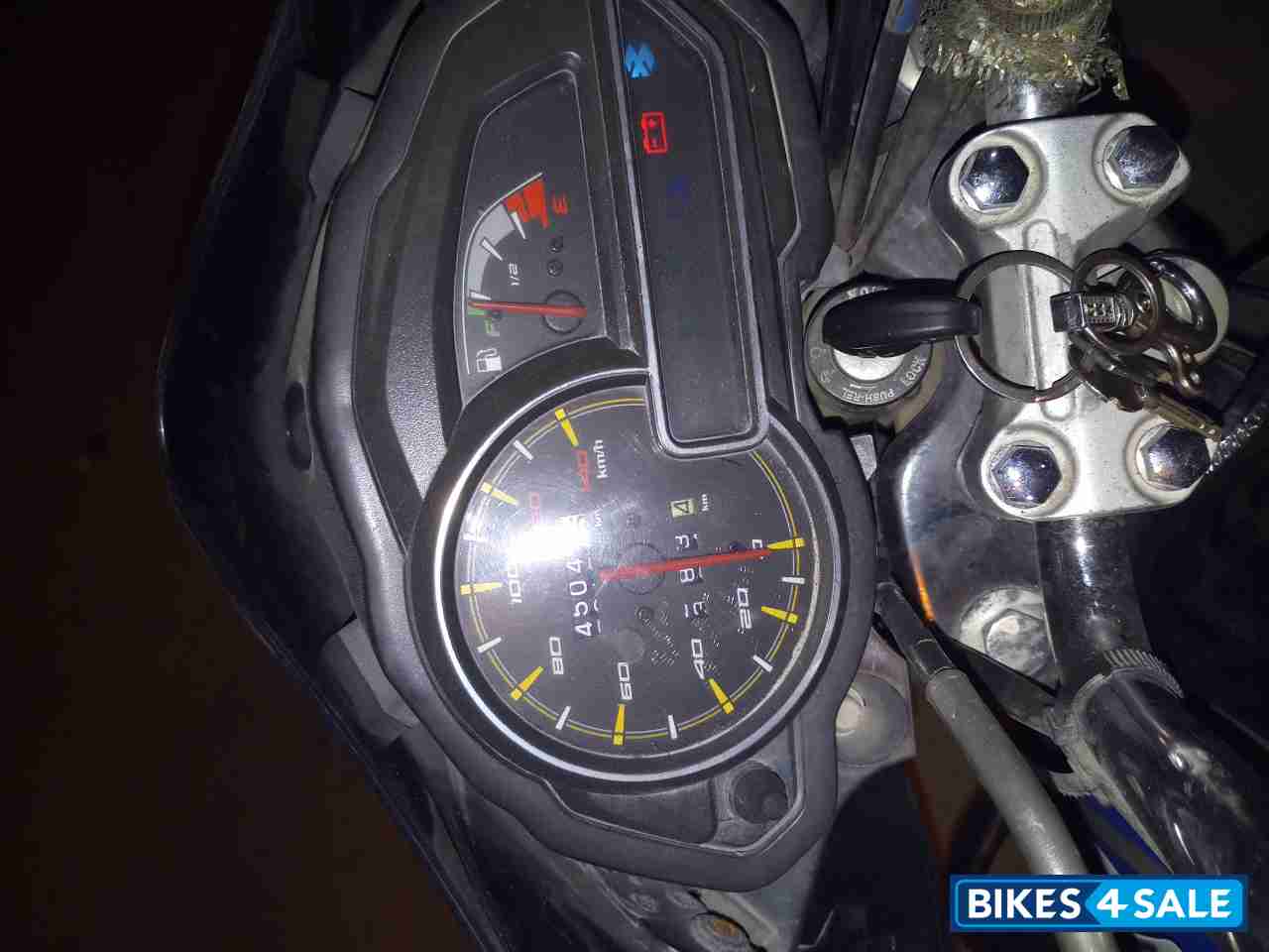 Black-blue Bajaj Discover 100T