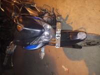 Black-blue Bajaj Discover 100T