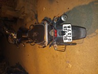 Black-blue Bajaj Discover 100T