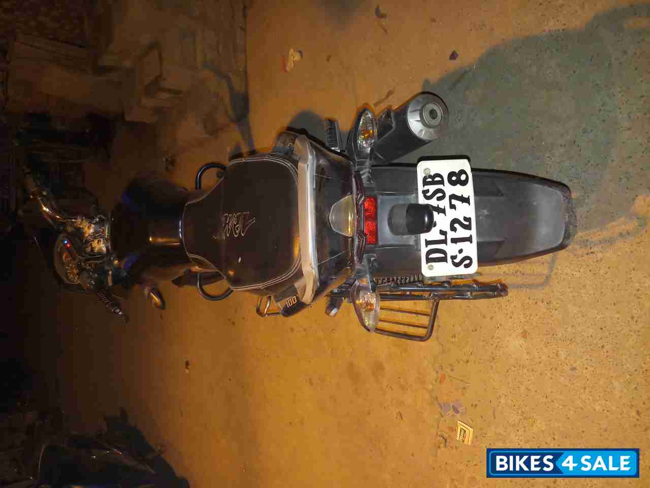 Black-blue Bajaj Discover 100T