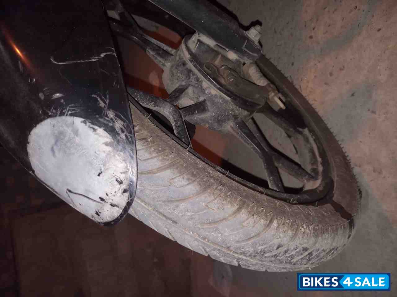 Black-blue Bajaj Discover 100T