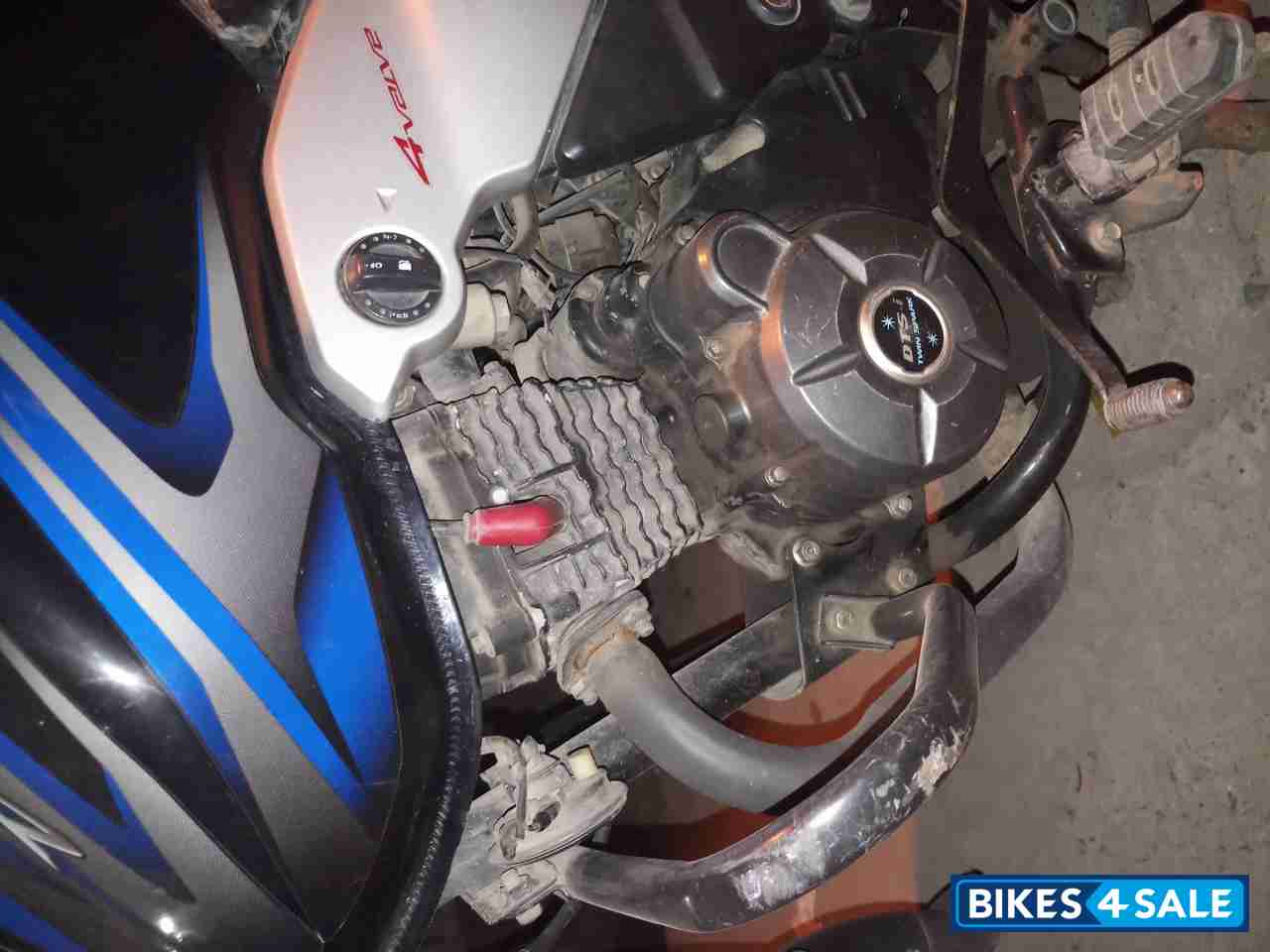 Black-blue Bajaj Discover 100T