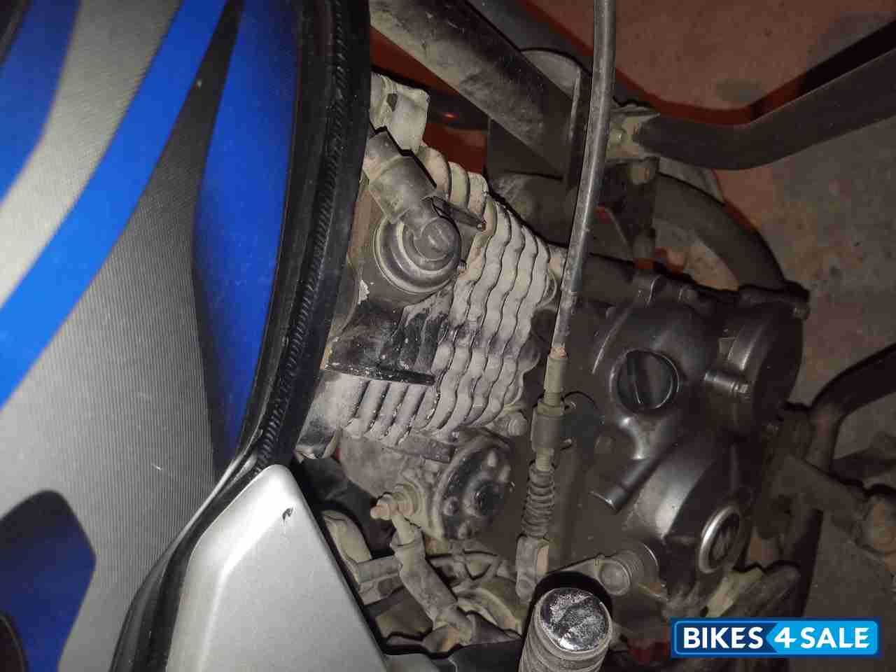 Black-blue Bajaj Discover 100T