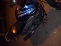 Black-blue Bajaj Discover 100T