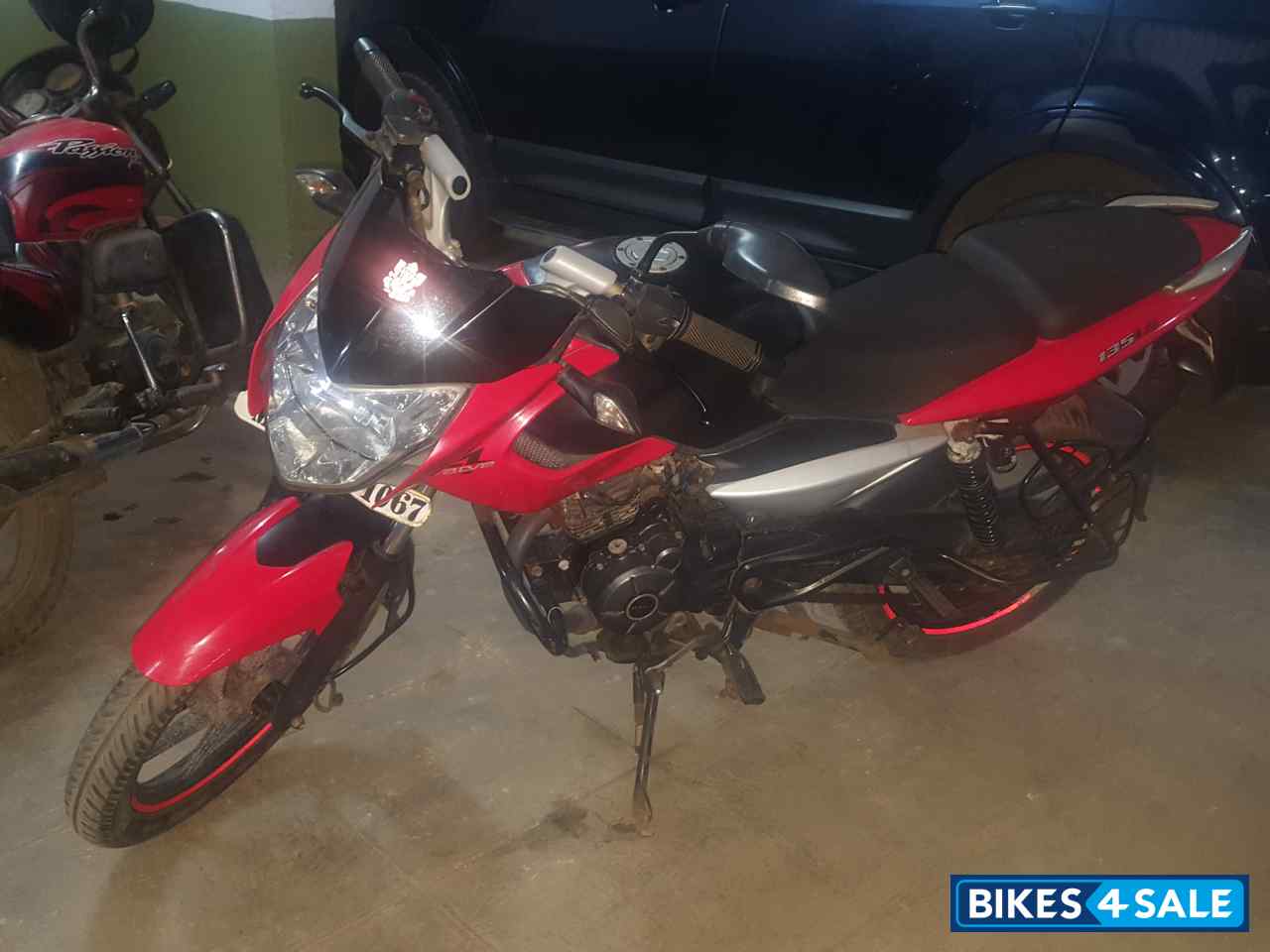 Red Bajaj Pulsar 135LS