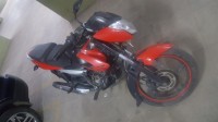 Red Bajaj Pulsar 135LS
