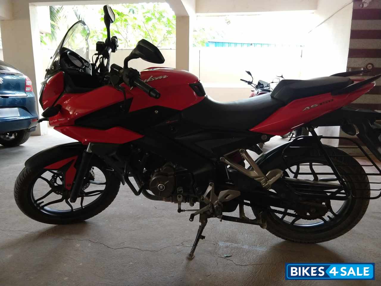 Red Bajaj Pulsar AS 150