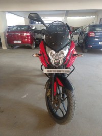 Red Bajaj Pulsar AS 150