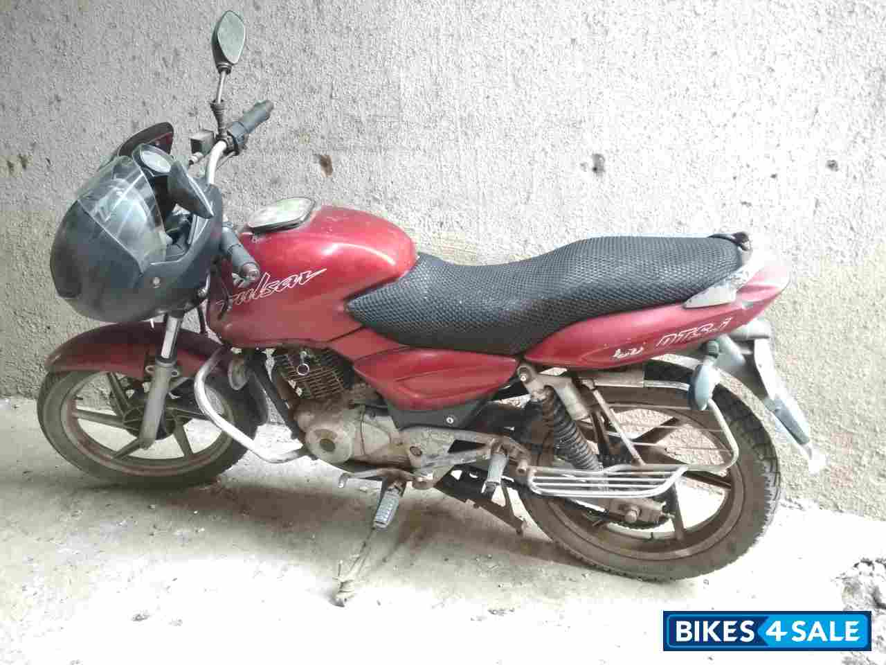 Red Bajaj Pulsar 135LS