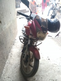 Red Bajaj Pulsar 135LS