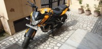 Yellow Bajaj Pulsar 200 NS