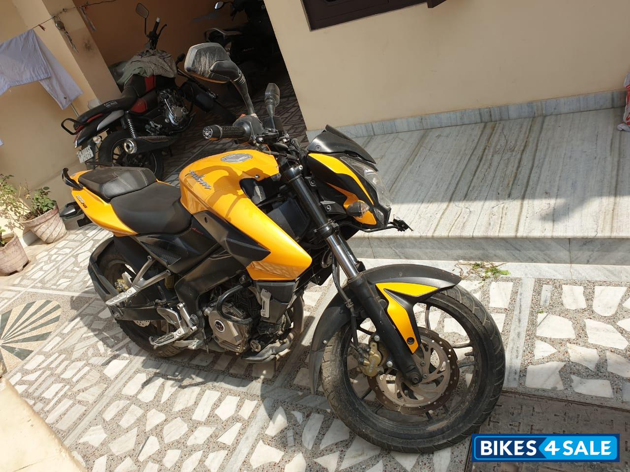 Yellow Bajaj Pulsar 200 NS