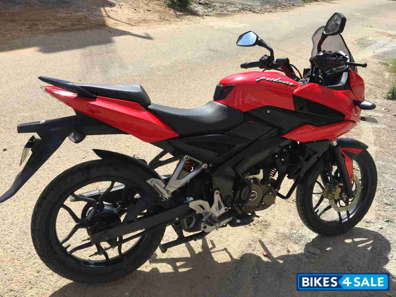 Red Bajaj Pulsar AS 150