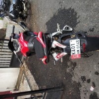 Red Bajaj Pulsar RS 200 ABS