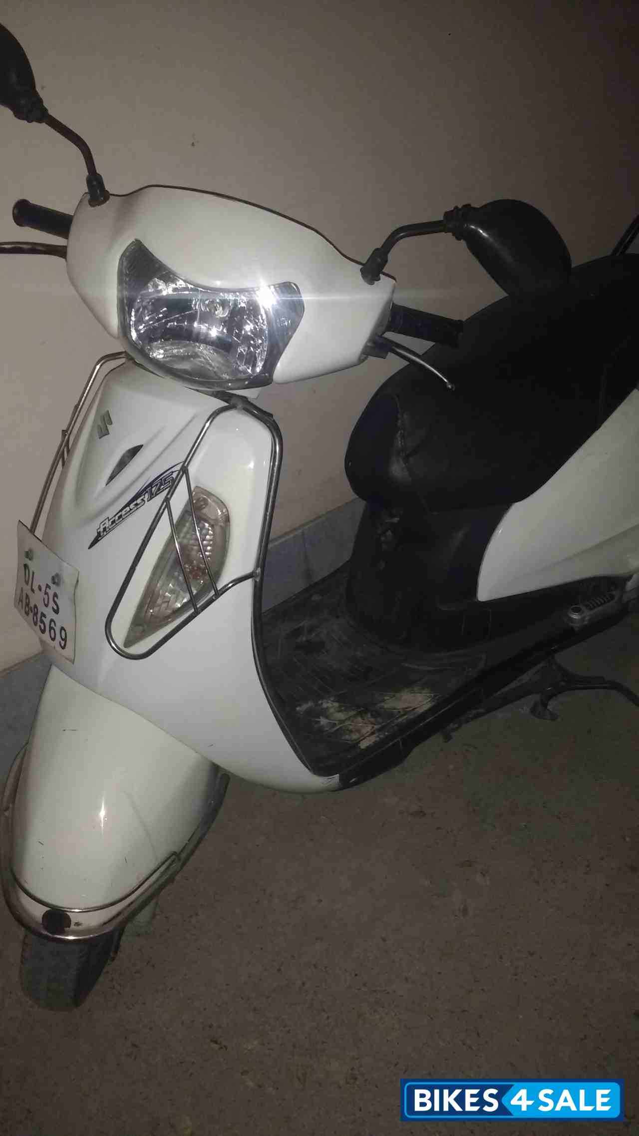 White Suzuki Access 125