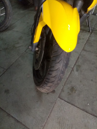 Yellow Bajaj Pulsar RS 200 ABS