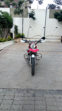 Red Royal Enfield Bullet Electra Twinspark