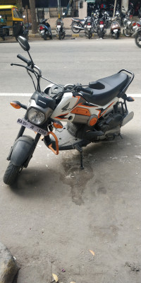 Orange And White Honda Navi