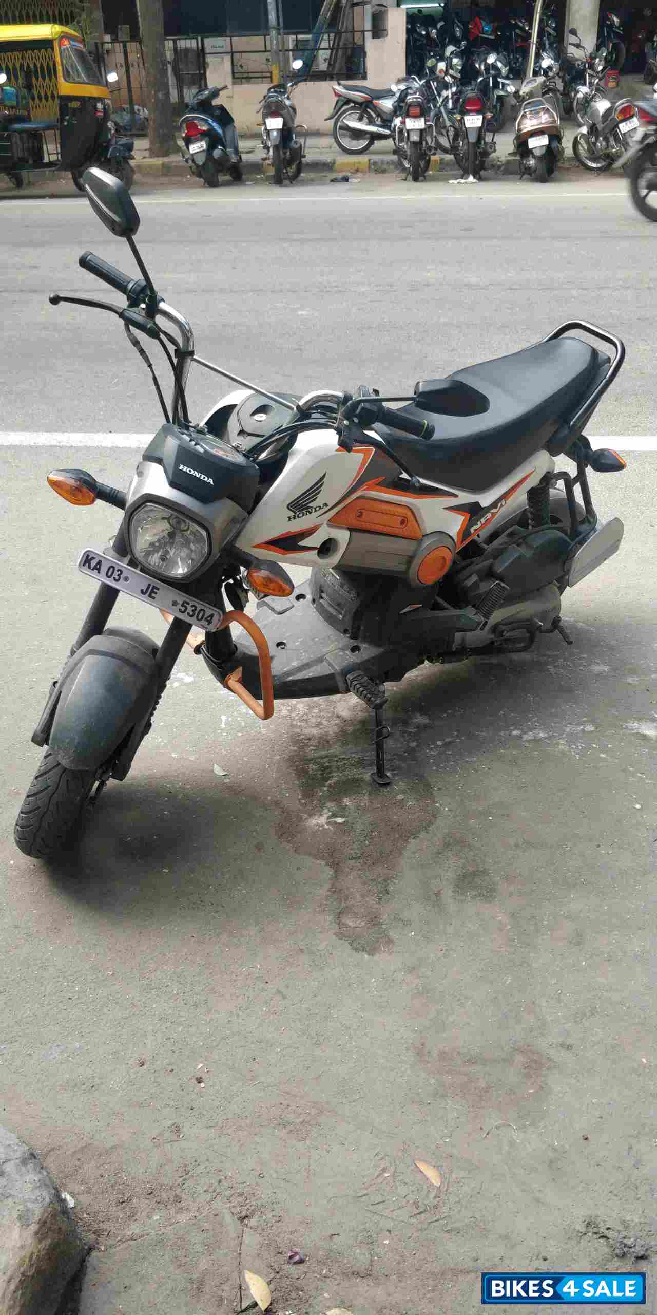 Orange And White Honda Navi