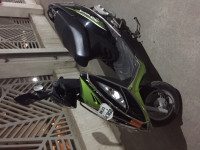 Black & Green TVS Scooty Streak