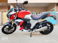 Red And White Mahindra Mojo XT 300