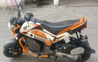 White And Orange Honda Navi