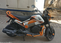 White And Orange Honda Navi