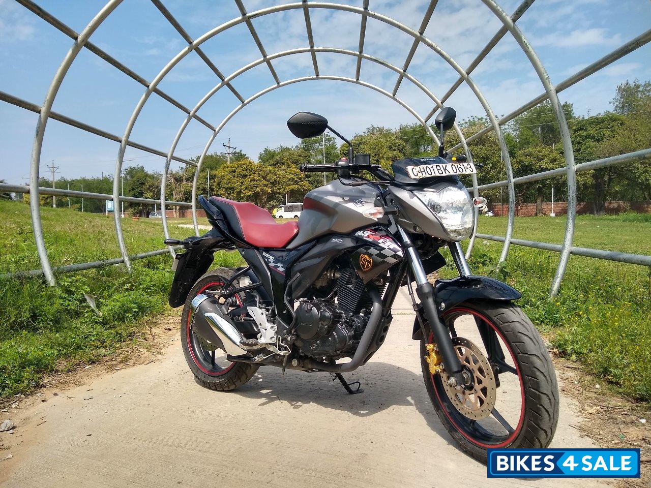 Candy Sonoma Red Metallic And Suzuki Gixxer SP