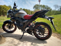 Candy Sonoma Red Metallic And Suzuki Gixxer SP