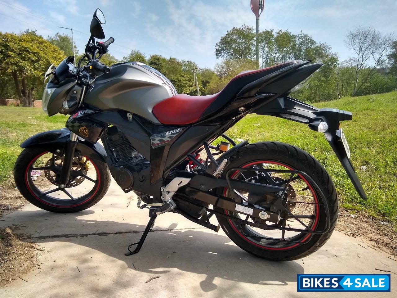 Candy Sonoma Red Metallic And Suzuki Gixxer SP