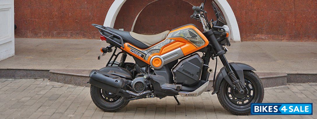 Sparky Orange Honda Navi Adventure