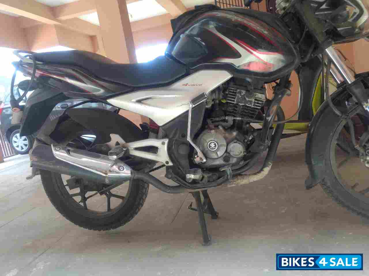 Black With Red Bajaj Discover 125 ST