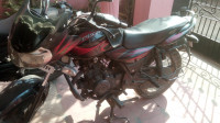 Red And Black Bajaj Discover 150 F
